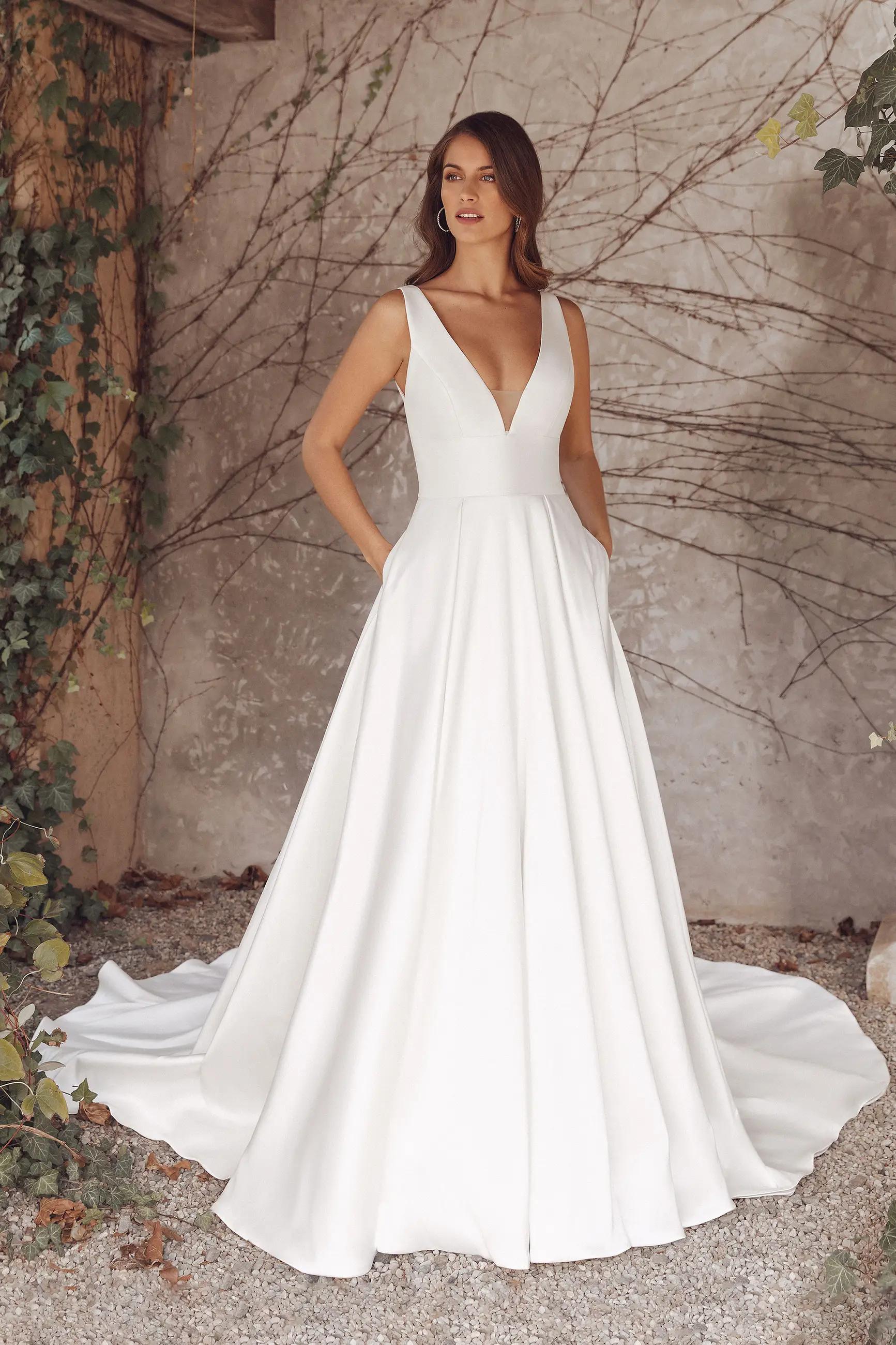 Minimalist Magic: Clean, Classic, and Chic Wedding Dresses for Modern Brides Image